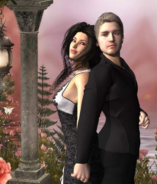 Man in black standing back to back with lady in black dress.